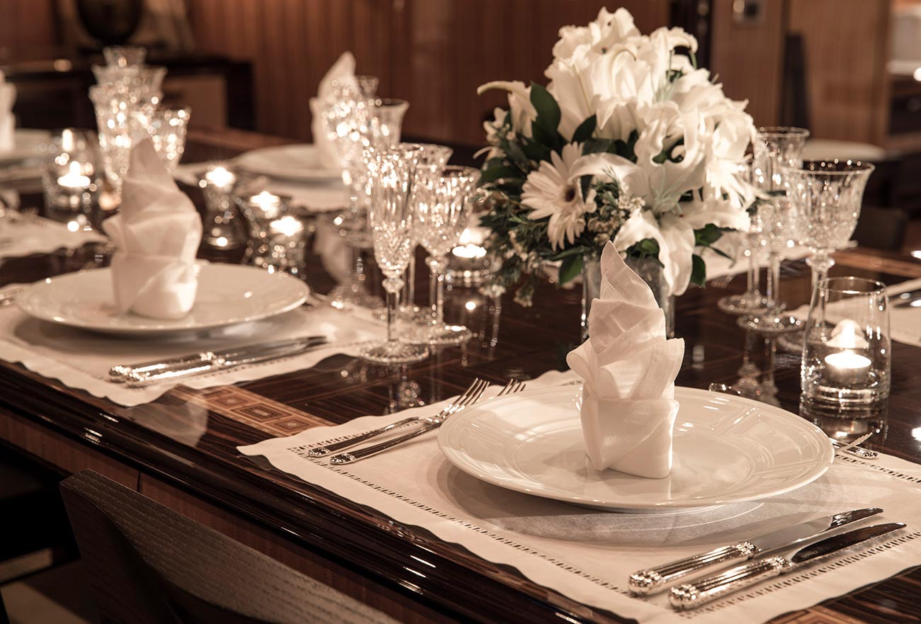 Formal dining room onboard a superyacht